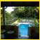 <em>J'Ouvert Villa</em> a pool view from verandah